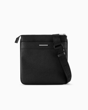 Faux leather shoulder bag with front pocket