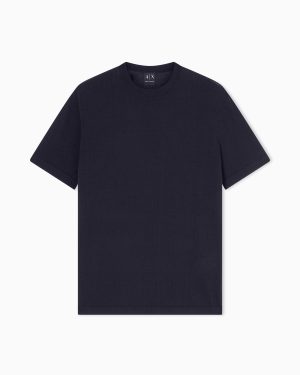Navy short-sleeve crewneck t-shirt laid flat, minimalist basic top from A|X (no visible graphics)